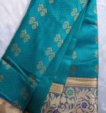 Teal Green Poly Crepe Woven Design Kanjeevaram Saree